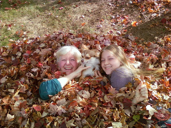 Kathleen & Kyra with dog Weeness in leaves